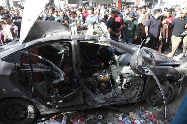 Palestinians Gather at Site of Israeli Strike in Gaza City others. May 20, 2026: Palestinians Gather at Site of Israeli Strike in Gaza City Palestinians gather at the site of an Israeli airstrike that targeted a vehicle on al-Shuhada Street in Gaza City, on May 19, 2026. According to local sources, the strike killed one person and wounded several others. Copyright: xx