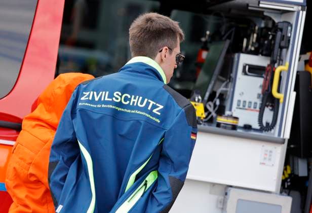 Germany, Berlin,Federal Minister of the Interior Alexander Dobrindt presents civil protection pact and hands over 13 emergency vehicles for civil protection
