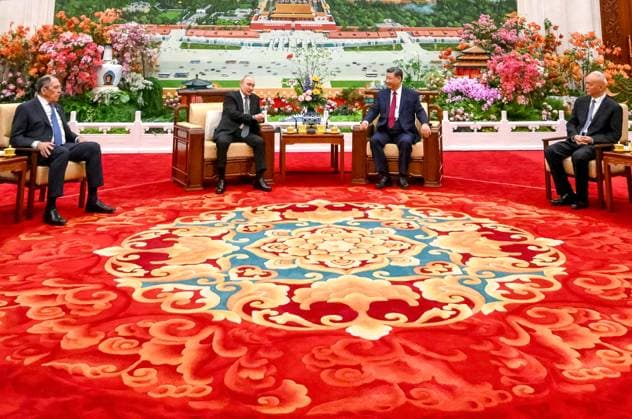 China Russia 9170098 20.05.2026 Russian President Vladimir Putin and Chinese President Xi Jinping have tea following their meeting, as Russian Foreign Minister Sergey Lavrov and Director of the Chinese Communist Party General Office Cai Qi sit nearby, at the Great Hall of the People in Beijing, China. Kristina Solovyova Sputnik Beijing China  Copyright: xKristinaxSolovyovax