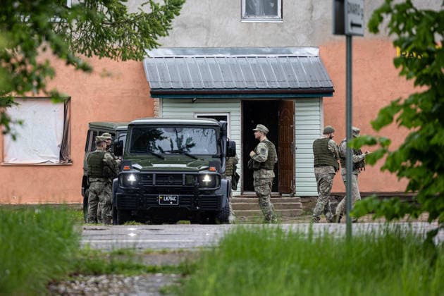 Military police and Lithuanian army search for a drone in Gudiai village Gudiai, 2026 May 20  Copyright: xx