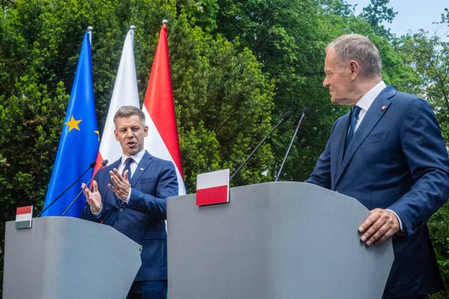 May 20, 2026, Warsaw, Poland: New Hungarian Prime Minister, Peter Magyar and Polish Prime Minister, Donald Tusk held a joint press conference during their meeting at the Polish Prime Minister s residence. On the morning of Wednesday, the 20th of May, on his first foreign visit, the new Prime Minister of Hungary, Peter Magyar, meets with Polish Prime Minister Donald Tusk. The visit symbolically marks the opening of a new phase in Budapest s relations with Europe. During the meeting the Prime Ministers discuss Magyar s victory in the recent Hungarian elections, the Polish-Hungarian relationship, and the issue of Zbigniew Ziobra and Marcin Romanowski - two Polish politicians evading prosecution in Poland by hiding in Hungary. After the meeting - ZUMAs197 20260520_aaa_s197_271 Copyright: xNeilxMiltonx