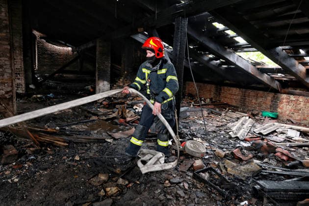 Russian drone attack on Odesa leaves people injured A firefighter works to eliminate the aftermath of a Russian drone attack in Odesa, Ukraine, on May 18, 2026. As a result of a massive overnight attack by Russian strike drones, several residential buildings in the Prymorskyi and Kyivskyi districts sustained significant damage. Roofs of three-storey buildings were destroyed, while a one-storey house was ruined in another area. Buildings of a city lyceum and a kindergarten were also damaged. Two people, an 11-year-old boy and a 59-year-old man, were injured, Credit:Nina Liashonok Ukrinform Avalon Ukraine, Odesa  Copyright: xNinaxLiashonokx xUkrinformx xAvalonx 1102292064