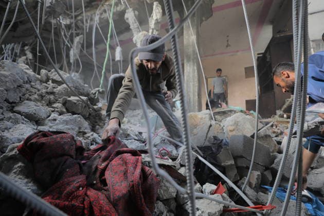 Palestinians Inspect Destroyed Homes After Israeli Strike in al-Maghazi Palestinians inspect their destroyed homes following an overnight Israeli airstrike in al-Maghazi refugee camp in the central Gaza Strip, on May 21, 2026. Israeli warplanes carried out a strike overnight targeting a house belonging to the Abu Ismail family after residents were warned to evacuate the building. Photo by Hassan al-Jedi apaimages Nusairat Gaza Strip Palestinian Territory 210526_Maghazi_HJ_00(18).jpeg Copyright: xapaimagesxHassanxal-Jedixx xapaimagesx