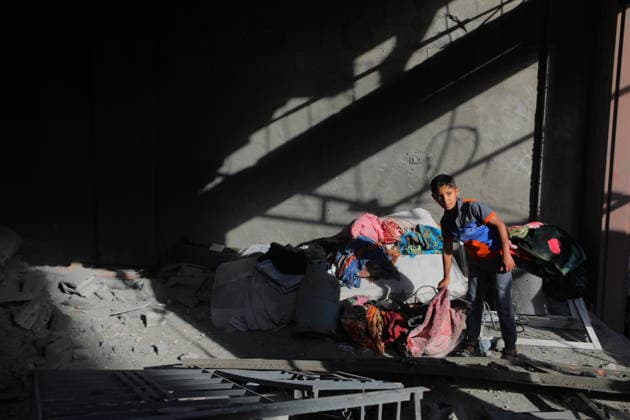 Palestinians Inspect Destroyed Homes After Israeli Strike in al-Maghazi Palestinians inspect their destroyed homes following an overnight Israeli airstrike in al-Maghazi refugee camp in the central Gaza Strip, on May 21, 2026. Israeli warplanes carried out a strike overnight targeting a house belonging to the Abu Ismail family after residents were warned to evacuate the building. Photo by Hassan al-Jedi apaimages Nusairat Gaza Strip Palestinian Territory 210526_Maghazi_HJ_00(13).jpeg Copyright: xapaimagesxHassanxal-Jedixx xapaimagesx