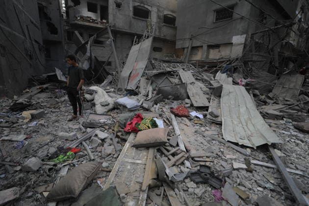 Palestinians Inspect Destroyed Homes After Israeli Strike in al-Maghazi Palestinians inspect their destroyed homes following an overnight Israeli airstrike in al-Maghazi refugee camp in the central Gaza Strip, on May 21, 2026. Israeli warplanes carried out a strike overnight targeting a house belonging to the Abu Ismail family after residents were warned to evacuate the building. Photo by Hassan al-Jedi apaimages Nusairat Gaza Strip Palestinian Territory 210526_Maghazi_HJ_00(17).jpeg Copyright: xapaimagesxHassanxal-Jedixx xapaimagesx