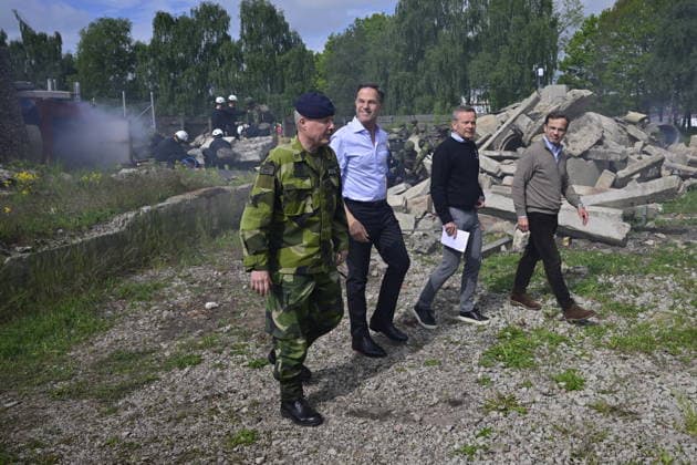 REVINGE, SWEDEN 20260521 Lieutenant General Carl Johan Edström, Head of the Swedish Armed Forces Operations Command, NATO Secretary General Mark Rutte, Mikael Frisell, Director General of the Swedish Civil Defense Agency and Prime Mini  Copyright: xJohanxNilsson TTx NATOS UTRIKESMINISTERMÖTE REVINGE hQ0esxdkAGc