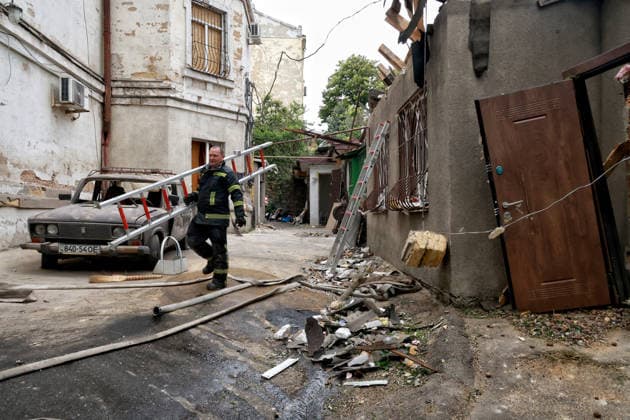 RECORD DATE NOT STATED Russian Drone Attack on Odesa Leaves People Injured A firefighter works to eliminate the aftermath of a Russian drone attack in Odesa, Ukraine, on May 18, 2026. As a result of a massive overnight attack by Russian strike drones, several residential buildings in the Prymorskyi and Kyivskyi districts sustained significant damage. Roofs of three-storey buildings were destroyed, while a one-storey house was ruined in another area. Buildings of a city lyceum and a kindergarten were also damaged. Two people, an 11-year-old boy and a 59-year-old man, were injured Photo by Nina Liashonok Ukrinform ABACAPRESS.COM Odesa Ukraine  Copyright: xLyashonokxNina Ukrinform ABACAx
