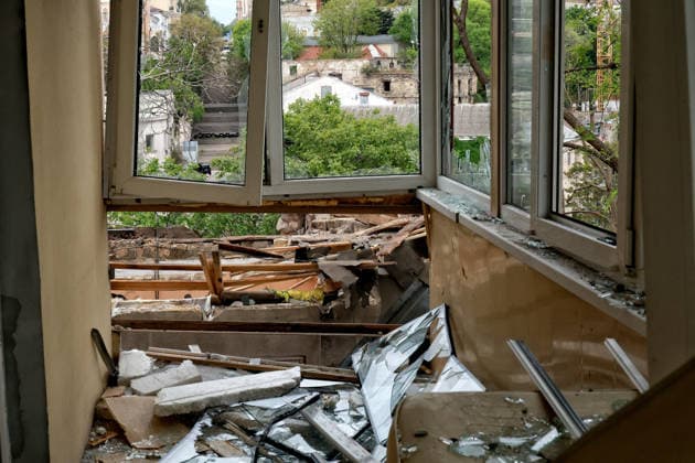 RECORD DATE NOT STATED Russian Drone Attack on Odesa Leaves People Injured A balcony damaged in a Russian drone attack in Odesa, Ukraine, on May 18, 2026. As a result of a massive overnight attack by Russian strike drones, several residential buildings in the Prymorskyi and Kyivskyi districts sustained significant damage. Roofs of three-storey buildings were destroyed, while a one-storey house was ruined in another area. Buildings of a city lyceum and a kindergarten were also damaged. Two people, an 11-year-old boy and a 59-year-old man, were injured Photo by Nina Liashonok Ukrinform ABACAPRESS.COM Odesa Ukraine  Copyright: xLyashonokxNina Ukrinform ABACAx