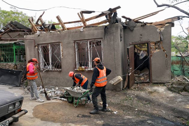 RECORD DATE NOT STATED Russian Drone Attack on Odesa Leaves People Injured Municipal workers deal with the aftermath of a Russian drone attack in Odesa, Ukraine, on May 18, 2026. As a result of a massive overnight attack by Russian strike drones, several residential buildings in the Prymorskyi and Kyivskyi districts sustained significant damage. Roofs of three-storey buildings were destroyed, while a one-storey house was ruined in another area. Buildings of a city lyceum and a kindergarten were also damaged. Two people, an 11-year-old boy and a 59-year-old man, were injured Photo by Nina Liashonok Ukrinform ABACAPRESS.COM Odesa Ukraine  Copyright: xLyashonokxNina Ukrinform ABACAx