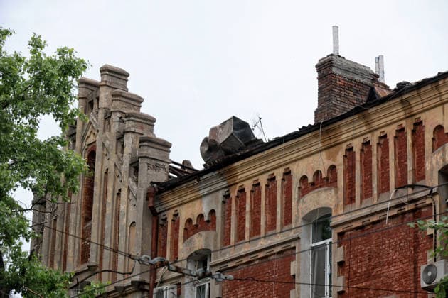 RECORD DATE NOT STATED Russian Drone Attack on Odesa Leaves People Injured A building damaged in a Russian drone attack is seen in Odesa, Ukraine, on May 18, 2026. As a result of a massive overnight attack by Russian strike drones, several residential buildings in the Prymorskyi and Kyivskyi districts sustained significant damage. Roofs of three-storey buildings were destroyed, while a one-storey house was ruined in another area. Buildings of a city lyceum and a kindergarten were also damaged. Two people, an 11-year-old boy and a 59-year-old man, were injured Photo by Nina Liashonok Ukrinform ABACAPRESS.COM Odesa Ukraine  Copyright: xLyashonokxNina Ukrinform ABACAx
