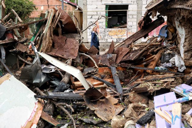 RECORD DATE NOT STATED Russian Drone Attack on Odesa Leaves People Injured A woman walks past a private residential house destroyed as a result of a Russian drone attack in Odesa, Ukraine, on May 20, 2026. During the night of May 20, Odesa came under a massive attack by Russian strike drones. The attack caused destruction of residential buildings, fires at commercial facilities, and damage to critical infrastructure. One civilian was injured Photo by Nina Liashonok Ukrinform ABACAPRESS.COM Odesa Ukraine  Copyright: xLyashonokxNina Ukrinform ABACAx
