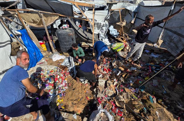 Palestinian Rescue Teams Inspect Site of Israeli Strike in Khan Younis Palestinian paramedics, civil defense crews and residents inspect the site of an Israeli airstrike that targeted a tent sheltering displaced people in the Mawasi area of Khan Younis in the southern Gaza Strip, on May 21, 2026. According to local sources, the strike wounded several displaced Palestinians, sparked a fire in the targeted tent and caused extensive damage to nearby tents. Photo by Tariq Mohammad APA Images Khan Yunis Gaza Strip Palestinian Territory 210526_Khan_Yunis_TM_02(20) Copyright: xapaimagesxTariqxMohammad xapaimagesx