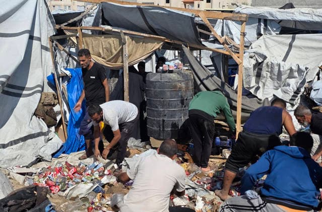 Palestinian Rescue Teams Inspect Site of Israeli Strike in Khan Younis Palestinian paramedics, civil defense crews and residents inspect the site of an Israeli airstrike that targeted a tent sheltering displaced people in the Mawasi area of Khan Younis in the southern Gaza Strip, on May 21, 2026. According to local sources, the strike wounded several displaced Palestinians, sparked a fire in the targeted tent and caused extensive damage to nearby tents. Photo by Tariq Mohammad APA Images Khan Yunis Gaza Strip Palestinian Territory 210526_Khan_Yunis_TM_02(11) Copyright: xapaimagesxTariqxMohammad xapaimagesx
