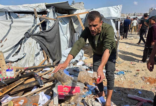 Palestinian Rescue Teams Inspect Site of Israeli Strike in Khan Younis Palestinian paramedics, civil defense crews and residents inspect the site of an Israeli airstrike that targeted a tent sheltering displaced people in the Mawasi area of Khan Younis in the southern Gaza Strip, on May 21, 2026. According to local sources, the strike wounded several displaced Palestinians, sparked a fire in the targeted tent and caused extensive damage to nearby tents. Photo by Tariq Mohammad APA Images Khan Yunis Gaza Strip Palestinian Territory 210526_Khan_Yunis_TM_02(3) Copyright: xapaimagesxTariqxMohammad xapaimagesx