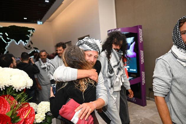 Detained Global Sumud aid flotilla activists arrive in Istanbul ISTANBUL, TURKIYE - MAY 21: Members of Global Sumud Flotilla, who were detained by Israel in international waters, are welcomed at the Istanbul Airport s VIP Hall by their relatives and numerous officials in Istanbul, Turkiye on May 21, 2026. Three planes carrying activists from the Global Sumud humanitarian aid flotilla, detained earlier this week by Israel in international waters, arrived in Istanbul on Thursday. Three Turkish Airlines planes transporting the activists who were detained aboard the flotilla, which came under attack by the Israeli army in international waters while attempting to break the blockade on Gaza and deliver vital humanitarian aid, landed at Istanbul A  Copyright: x2026xAnadoluxSaffetxAzakx