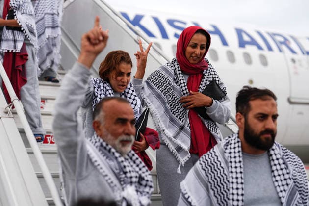 Detained Global Sumud aid flotilla activists arrive in Istanbul ISTANBUL, TURKIYE - MAY 21: Members of Global Sumud Flotilla, who were detained by Israel in international waters, arrive at Istanbul Airport with three Turkish Airlines (THY) planes in Istanbul, Turkiye on May 21, 2026. Three planes carrying activists from the Global Sumud humanitarian aid flotilla, detained earlier this week by Israel in international waters, arrived in Istanbul on Thursday. Three Turkish Airlines planes transporting the activists who were detained aboard the flotilla, which came under attack by the Israeli army in international waters while attempting to break the blockade on Gaza and deliver vital humanitarian aid, landed at Istanbul Airport. The activists  Copyright: x2026xAnadoluxHakanxAkgunx
