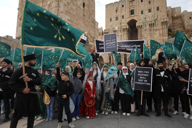Syrian Circassians commemorate to mark the 162nd anniversary of their exile in Aleppo ALEPPO, SYRIA - MAY 21: Circassians gather to commemorate the 162nd anniversary of the 1864 Circassian Exile, holding memorial events and honoring those who lost their lives during the deportation, on May 21, 2026, in Aleppo, Syria. Participants held a moment of silence in front of the Aleppo Citadel, wearing black T-shirts and traditional Circassian clothing while carrying Circassian and Syrian flags. Kasim Yusuf Anadolu Aleppo Syria. Editorial use only. Please get in touch for any other usage.  Copyright: x2026xAnadoluxKasimxYusufx