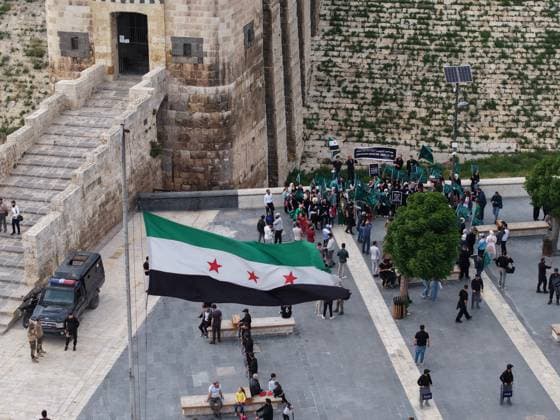 Syrian Circassians commemorate to mark the 162nd anniversary of their exile in Aleppo ALEPPO, SYRIA - MAY 21: Circassians gather to commemorate the 162nd anniversary of the 1864 Circassian Exile, holding memorial events and honoring those who lost their lives during the deportation, on May 21, 2026, in Aleppo, Syria. Participants held a moment of silence in front of the Aleppo Citadel, wearing black T-shirts and traditional Circassian clothing while carrying Circassian and Syrian flags. Kasim Yusuf Anadolu Aleppo Syria. Editorial use only. Please get in touch for any other usage.  Copyright: x2026xAnadoluxKasimxYusufx