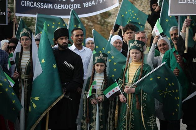 Syrian Circassians commemorate to mark the 162nd anniversary of their exile in Aleppo ALEPPO, SYRIA - MAY 21: Circassians gather to commemorate the 162nd anniversary of the 1864 Circassian Exile, holding memorial events and honoring those who lost their lives during the deportation, on May 21, 2026, in Aleppo, Syria. Participants held a moment of silence in front of the Aleppo Citadel, wearing black T-shirts and traditional Circassian clothing while carrying Circassian and Syrian flags. Kasim Yusuf Anadolu Aleppo Syria. Editorial use only. Please get in touch for any other usage.  Copyright: x2026xAnadoluxKasimxYusufx