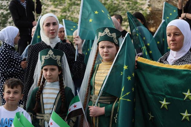 Syrian Circassians commemorate to mark the 162nd anniversary of their exile in Aleppo ALEPPO, SYRIA - MAY 21: Circassians gather to commemorate the 162nd anniversary of the 1864 Circassian Exile, holding memorial events and honoring those who lost their lives during the deportation, on May 21, 2026, in Aleppo, Syria. Participants held a moment of silence in front of the Aleppo Citadel, wearing black T-shirts and traditional Circassian clothing while carrying Circassian and Syrian flags. Kasim Yusuf Anadolu Aleppo Syria. Editorial use only. Please get in touch for any other usage.  Copyright: x2026xAnadoluxKasimxYusufx
