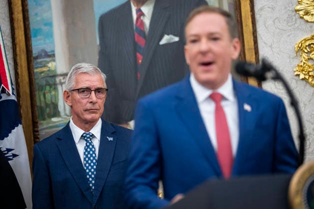 WASHINGTON, DC - MAY 21: Greg Foran, chief executive officer of The Kroger Co., left, listens as Environmental Protection Agency (EPA) Administrator Lee Zeldin speaks at an event with U.S. President Donald Trump on May 21, 2026 in the Oval Office at the White House in Washington, D.C. Trump said he would rescind Biden-era regulations on refrigerators and air conditioners. Copyright: xAlxDragox xPoolxviaxCNPx MediaPunchx