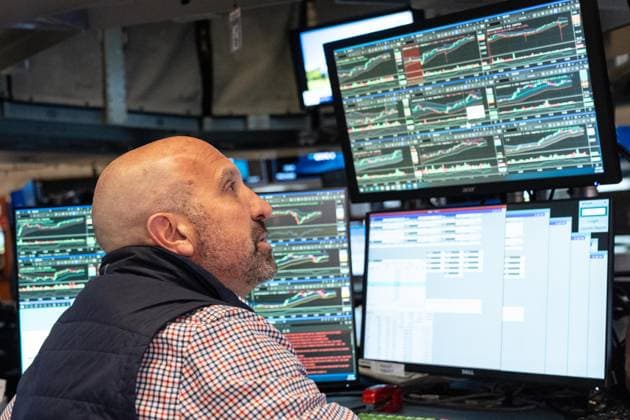 May 21, 2026, New York, New York, USA: A trader works on the floor of the New York Stock Exchange (NYSE) just before closing bell in New York, NY on May 21, 2026. New York USA - ZUMAr339 20260521_znp_r339_016 Copyright: xLevxRadinx