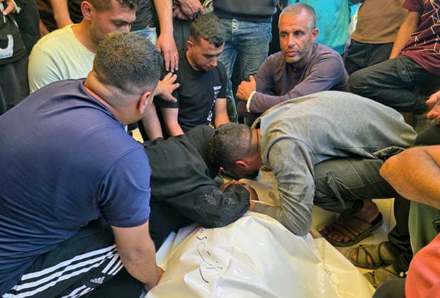 Palestinians Mourn Shepherd Killed Near Khan Younis Palestinians mourn the body of Raafat Breika, 42, who was killed by Israeli army fire while herding sheep near the Yellow Line south of Khan Younis in the southern Gaza Strip, on May 22, 2026. Photo by Tariq Mohammad APA Images Khan Yunis Gaza Strip Palestinian Territory 220526_Khan_Yunis_TM_00(4) Copyright: xapaimagesxTariqxMohammad xapaimagesx