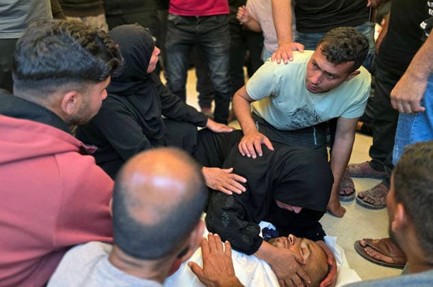 Palestinians Mourn Shepherd Killed Near Khan Younis Palestinians mourn the body of Raafat Breika, 42, who was killed by Israeli army fire while herding sheep near the Yellow Line south of Khan Younis in the southern Gaza Strip, on May 22, 2026. Photo by Tariq Mohammad APA Images Khan Yunis Gaza Strip Palestinian Territory 220526_Khan_Yunis_TM_00(9) Copyright: xapaimagesxTariqxMohammad xapaimagesx