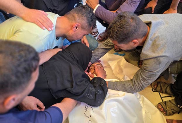 Palestinians Mourn Shepherd Killed Near Khan Younis Palestinians mourn the body of Raafat Breika, 42, who was killed by Israeli army fire while herding sheep near the Yellow Line south of Khan Younis in the southern Gaza Strip, on May 22, 2026. Photo by Tariq Mohammad APA Images Khan Yunis Gaza Strip Palestinian Territory 220526_Khan_Yunis_TM_00(2) Copyright: xapaimagesxTariqxMohammad xapaimagesx