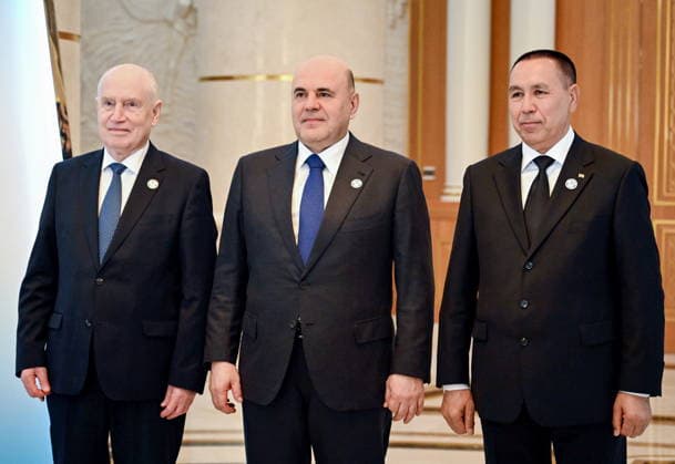 TURKMENISTAN, ASHGABAT - MAY 22, 2026: Sergei Lebedev, CIS (Commonwealth of Independent States) Secretary General, Mikhail Mishustin, Prime Minister of Russia, and Hojamyrat Geldimyradow (L-R), Deputy Chairman of the Cabinet of Ministers of Turkmenistan, pose during a group photo op for a meeting of the CIS (Commonwealth of Independent States) Council of the Heads of Government at the Garagum Hotel and Business Centre Ashgabat Turkmenistan  - ZUMAt113 20260522_zaa_t113_139 Copyright: xAlexanderxMiridonovx