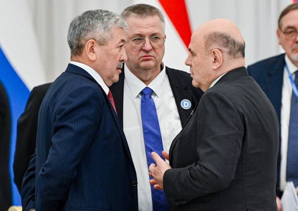 TURKMENISTAN, ASHGABAT - MAY 22, 2026: Mikhail Mishusti, Prime Minister of Russia, his deputy Alexei Overchuk, and Adylbek Kasymaliev (R-L), Chairman of the Cabinet of Ministers Head of the Presidential Administration of Kyrgyzstan, chat during an expanded meeting of the CIS (Commonwealth of Independent States) Council of the Heads of Government at the Garagum Hotel and Business Centre. Alexander Miridonov POOL TASS  92873453