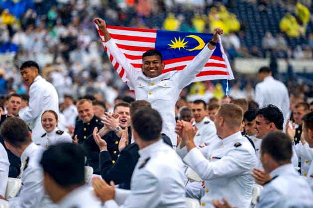 An international midshipmen from Malaysia is recognized during the U.S. Naval Academy Graduation and Commissioning Ceremony at the U.S. Naval Academy in Annapolis, Maryland on Friday, May 22, 2026. The Naval Academy has a total of 1059 graduates.  ANN20260522334 BONNIExCASH