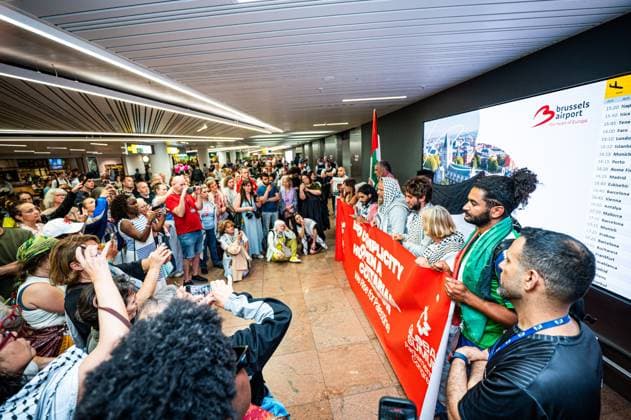 People welcome Belgian activists who were part of the Gaza Flotilla arrive at Brussels Airport, in Zaventem, Friday 22 May 2026.  EMILExWINDAL 174746731