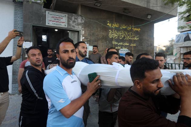 Palestinians Mourn Young Man Killed in Israeli Drone Strike in Gaza City Palestinians mourn the body of a young man who was killed in an Israeli drone strike targeting a group of civilians east of Gaza City, on May 22, 2026. According to local sources, the strike killed one Palestinian and wounded several others. Photo by Bilal Osama apaimages Gaza city Gaza Strip Palestinian Territory 220526_Gaza_BO_00(1) Copyright: xapaimagesxBilalxOsamax xapaimagesx