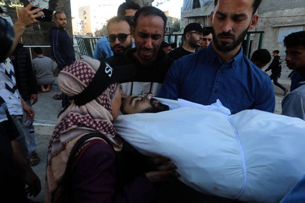 Palestinians Mourn Young Man Killed in Israeli Drone Strike in Gaza City Palestinians mourn the body of a young man who was killed in an Israeli drone strike targeting a group of civilians east of Gaza City, on May 22, 2026. According to local sources, the strike killed one Palestinian and wounded several others. Photo by Bilal Osama apaimages Gaza city Gaza Strip Palestinian Territory 220526_Gaza_BO_00(7) Copyright: xapaimagesxBilalxOsamax xapaimagesx