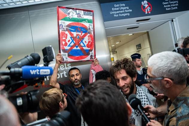 Belgian activist Isja pictured as Belgian activists who were part of the Gaza Flotilla arrive at Brussels Airport, in Zaventem, Friday 22 May 2026.  EMILExWINDAL 174748562