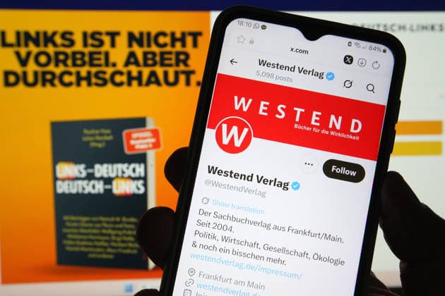 The X account of Westend Verlag was accessed on a smartphone Behind it, the online medium Nius was opened on a laptop In an open letter, 32 authors have announced their withdrawal from Westend Verlag They accuse the publishing house of bei