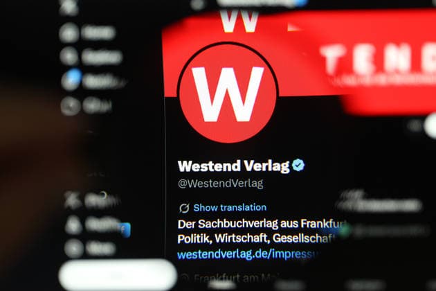 The X account of Westend Verlag was called up on a laptop A magnifying glass enlarges the publishers logo Symbol image Symbol photo Schnelsen Hamburg