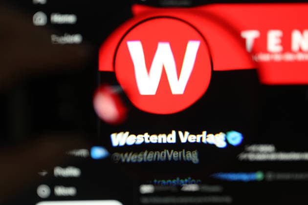 The X account of Westend Verlag was called up on a laptop A magnifying glass enlarges the publishers logo Symbol image Symbol photo Schnelsen Hamburg