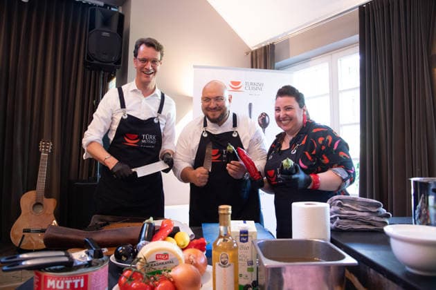 f l Hendrik WUEST, Wüst, CDU, Minister President of North Rhine-Westphalia, Ferdi UENLUE, Ünlü, Unlu, chef, Meltem KAPTAN, actress, Under the motto Turkish cooking with professionals and celebrities, the Turkish Consulate General is launching the Turkish Cuisine Action Week to introduce Turkish food culture on 22 May 2026 in Bergisch Gladbach Germany