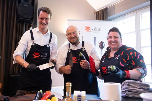 f l Hendrik WUEST, Wüst, CDU, Minister President of North Rhine-Westphalia, Ferdi UENLUE, Ünlü, Unlu, chef, Meltem KAPTAN, actress, Under the motto Turkish cooking with professionals and celebrities, the Turkish Consulate General is launching the Turkish Cuisine Action Week to introduce Turkish food culture on 22 May 2026 in Bergisch Gladbach Germany