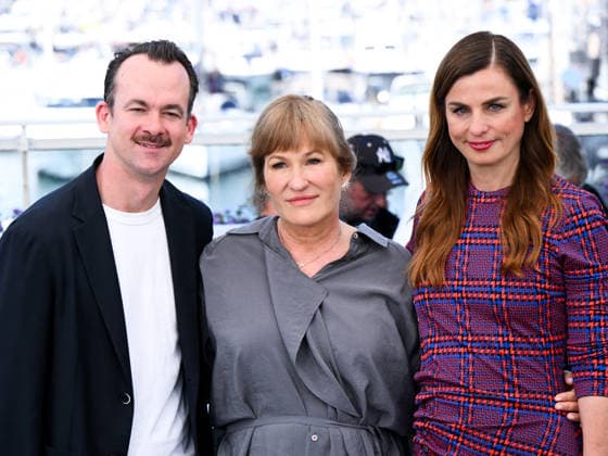 IPA84989334 - Cannes, 79th Cannes Film Festival 2026 - Day 12. Das Geträumte Abenteuer (The Dreamed Adventure). Pictured are Jonas Dornbach, Valeska Grisebach and Janine Jackowski.  Copyright: xAlbertoxTerenghix xPoolxPhotoxEventsx07x 84989334