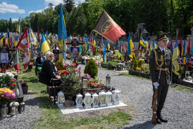 Commemoration procession held on Heroes Day in Lviv, Ukraine LVIV, UKRAINE, MAY 23: Military and civilians take part in a ceremony to honor the memory of fallen servicemen at the honorary burial grounds at the Lychakiv Cemetery during the Day of Heroes of Ukraine in Lviv, Ukraine, May 23, 2026. Also on this day, military personnel, police, members of youth organizations and civilians marched through the city in a solemn procession dedicated to all participants of the ATO JFO, war veterans and participants who died or are fighting for the freedom of Ukraine. Olena Znak Anadolu Lviv Ukraine. Editorial use only. Please get in touch for any other usage. Copyright: x2026xAnadoluxOlenaxZnakx