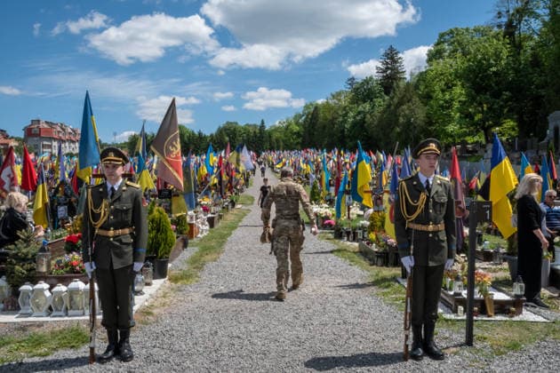 Commemoration procession held on Heroes Day in Lviv, Ukraine LVIV, UKRAINE, MAY 23: Military and civilians take part in a ceremony to honor the memory of fallen servicemen at the honorary burial grounds at the Lychakiv Cemetery during the Day of Heroes of Ukraine in Lviv, Ukraine, May 23, 2026. Also on this day, military personnel, police, members of youth organizations and civilians marched through the city in a solemn procession dedicated to all participants of the ATO JFO, war veterans and participants who died or are fighting for the freedom of Ukraine. Olena Znak Anadolu Lviv Ukraine. Editorial use only. Please get in touch for any other usage. Copyright: x2026xAnadoluxOlenaxZnakx