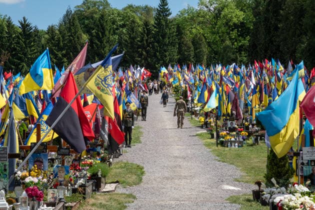 Commemoration procession held on Heroes Day in Lviv, Ukraine LVIV, UKRAINE, MAY 23: Military and civilians take part in a ceremony to honor the memory of fallen servicemen at the honorary burial grounds at the Lychakiv Cemetery during the Day of Heroes of Ukraine in Lviv, Ukraine, May 23, 2026. Also on this day, military personnel, police, members of youth organizations and civilians marched through the city in a solemn procession dedicated to all participants of the ATO JFO, war veterans and participants who died or are fighting for the freedom of Ukraine. Olena Znak Anadolu Lviv Ukraine. Editorial use only. Please get in touch for any other usage. Copyright: x2026xAnadoluxOlenaxZnakx