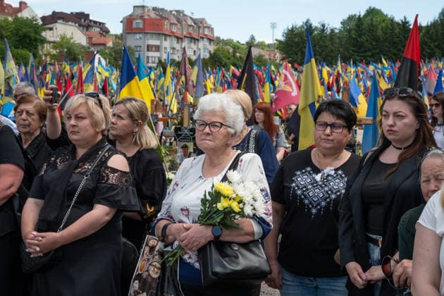 Commemoration procession held on Heroes Day in Lviv, Ukraine LVIV, UKRAINE, MAY 23: Military and civilians take part in a ceremony to honor the memory of fallen servicemen at the honorary burial grounds at the Lychakiv Cemetery during the Day of Heroes of Ukraine in Lviv, Ukraine, May 23, 2026. Also on this day, military personnel, police, members of youth organizations and civilians marched through the city in a solemn procession dedicated to all participants of the ATO JFO, war veterans and participants who died or are fighting for the freedom of Ukraine. Olena Znak Anadolu Lviv Ukraine. Editorial use only. Please get in touch for any other usage. Copyright: x2026xAnadoluxOlenaxZnakx