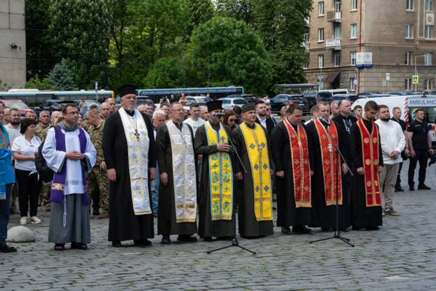 Commemoration procession held on Heroes Day in Lviv, Ukraine LVIV, UKRAINE, MAY 23: Military and civilians take part in a ceremony to honor the memory of fallen servicemen at the honorary burial grounds at the Lychakiv Cemetery during the Day of Heroes of Ukraine in Lviv, Ukraine, May 23, 2026. Also on this day, military personnel, police, members of youth organizations and civilians marched through the city in a solemn procession dedicated to all participants of the ATO JFO, war veterans and participants who died or are fighting for the freedom of Ukraine. Olena Znak Anadolu Lviv Ukraine. Editorial use only. Please get in touch for any other usage. Copyright: x2026xAnadoluxOlenaxZnakx