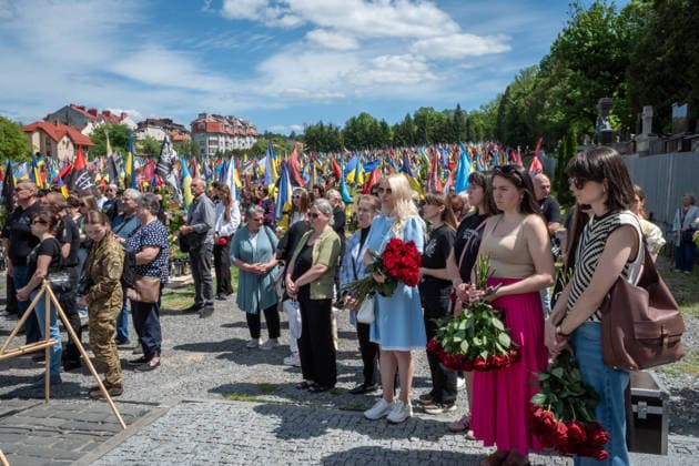 Commemoration procession held on Heroes Day in Lviv, Ukraine LVIV, UKRAINE, MAY 23: Military and civilians take part in a ceremony to honor the memory of fallen servicemen at the honorary burial grounds at the Lychakiv Cemetery during the Day of Heroes of Ukraine in Lviv, Ukraine, May 23, 2026. Also on this day, military personnel, police, members of youth organizations and civilians marched through the city in a solemn procession dedicated to all participants of the ATO JFO, war veterans and participants who died or are fighting for the freedom of Ukraine. Olena Znak Anadolu Lviv Ukraine. Editorial use only. Please get in touch for any other usage. Copyright: x2026xAnadoluxOlenaxZnakx