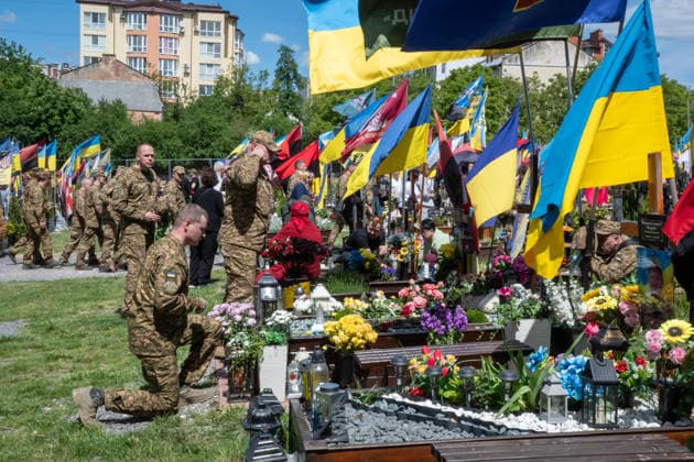 Commemoration procession held on Heroes Day in Lviv, Ukraine LVIV, UKRAINE, MAY 23: Military and civilians take part in a ceremony to honor the memory of fallen servicemen at the honorary burial grounds at the Lychakiv Cemetery during the Day of Heroes of Ukraine in Lviv, Ukraine, May 23, 2026. Also on this day, military personnel, police, members of youth organizations and civilians marched through the city in a solemn procession dedicated to all participants of the ATO JFO, war veterans and participants who died or are fighting for the freedom of Ukraine. Olena Znak Anadolu Lviv Ukraine. Editorial use only. Please get in touch for any other usage. Copyright: x2026xAnadoluxOlenaxZnakx