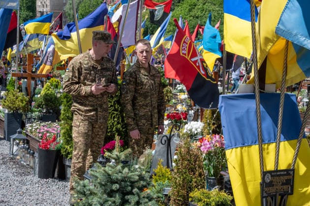 Commemoration procession held on Heroes Day in Lviv, Ukraine LVIV, UKRAINE, MAY 23: Military and civilians take part in a ceremony to honor the memory of fallen servicemen at the honorary burial grounds at the Lychakiv Cemetery during the Day of Heroes of Ukraine in Lviv, Ukraine, May 23, 2026. Also on this day, military personnel, police, members of youth organizations and civilians marched through the city in a solemn procession dedicated to all participants of the ATO JFO, war veterans and participants who died or are fighting for the freedom of Ukraine. Olena Znak Anadolu Lviv Ukraine. Editorial use only. Please get in touch for any other usage. Copyright: x2026xAnadoluxOlenaxZnakx